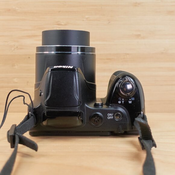 The Nikon Coolpix L330 is a vintage-style 20.2MP digital camera featuring a powe - Picture 6 of 7